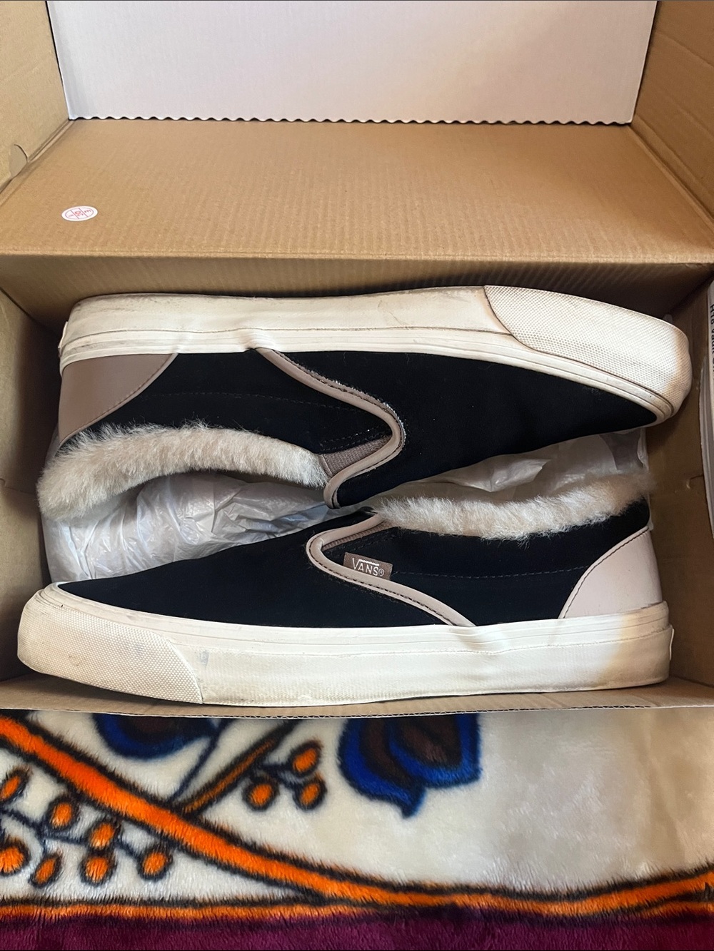 Vans Black Slip-On Sneakers with Taupe Trim and Fur Lining